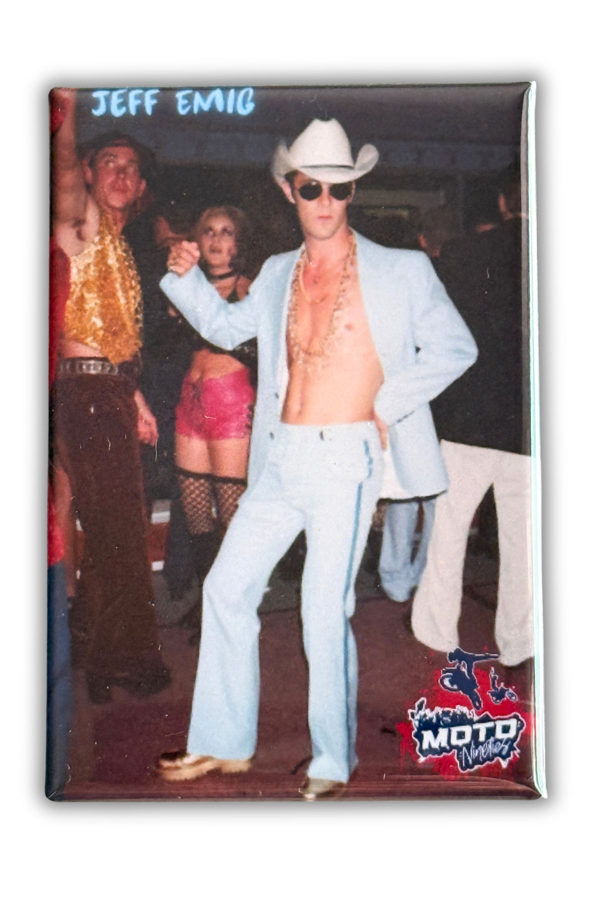 Jeff Emig wearing a cowboy hat and retro suit at a motocross-era party event. Moto Nineties 2x3 collectible magnet.