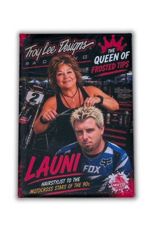 Launi, known as the Queen of Frosted Tips, styles a motocross rider's hair in this fun Moto Nineties collectible magnet celebrating 1990s motocross culture.