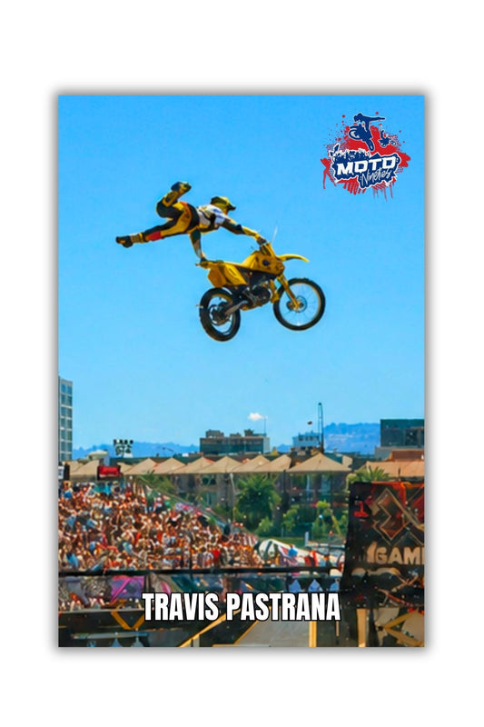 Travis Pastrana flies high above the X Games freestyle motocross course in front of a packed crowd during a memorable action sports moment.